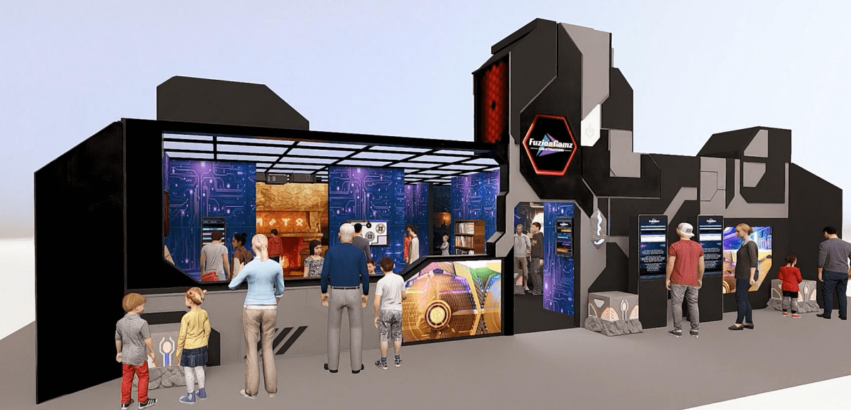 A group of people standing around in front of an exhibit.